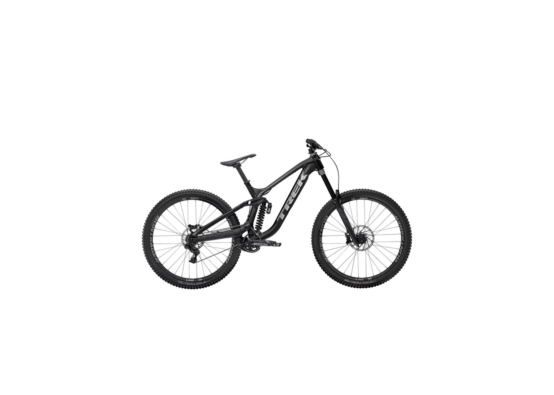 A sleek black mountain bike with a sturdy frame, thick tires, and suspension system, photographed against a white background, conveying a sense of adventure.